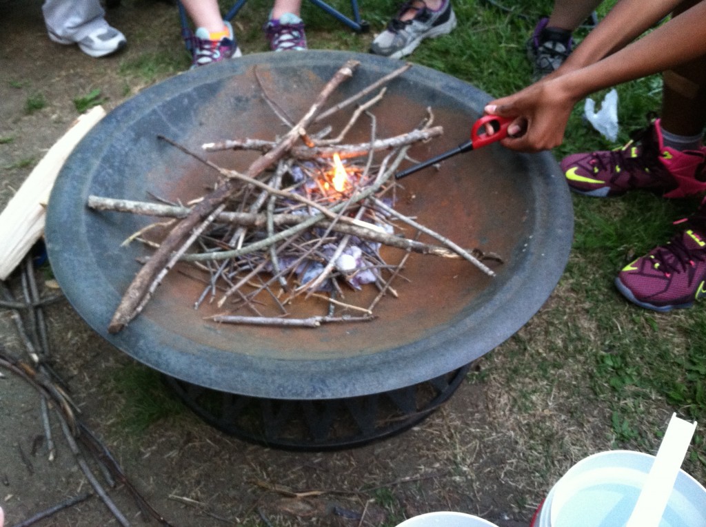 Teaching my Girl Scout troop how to properly build a campfire.