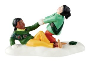 This Girl Scout figurine shows the sisterhood between fellow scouts when they are out playing in the snow.