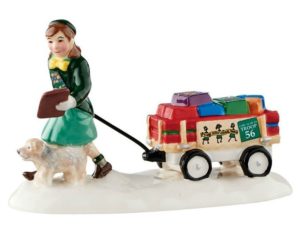 A fun gift to give your favorite Girl Scout-a figurine of a scout selling cookies.