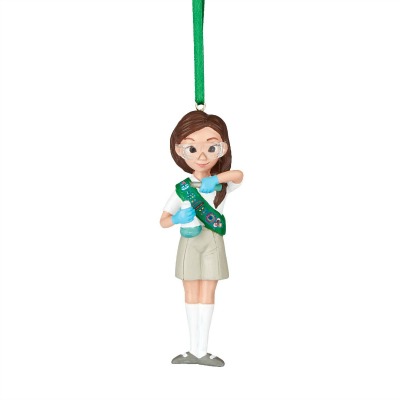 This Junior Girl Scout Christmas ornament features a young girl wearing science goggles and doing an experiment.