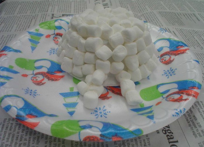 Making a marshmallow igloo is a fun craft to make at your December Girl Scout party.