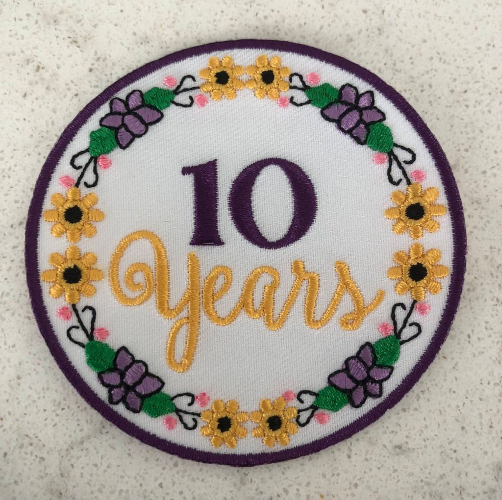 Girl Scout 10 years in scouting patch